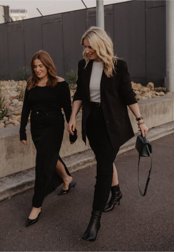 There's nothing more versatile than a black skirt, as seen on David Jones' Buyers Danielle Santin & Natasha Halket styled with Nobody Denim, Bassike, Matteau, and Alias Mae.