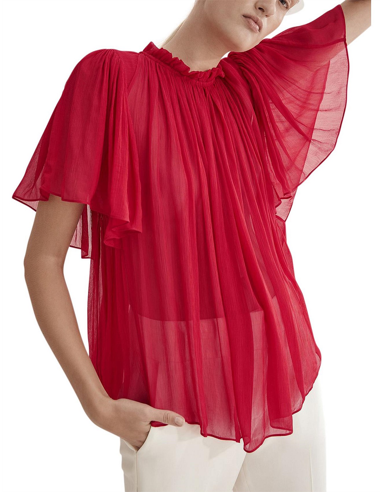 red blouse with ruffle sleeves