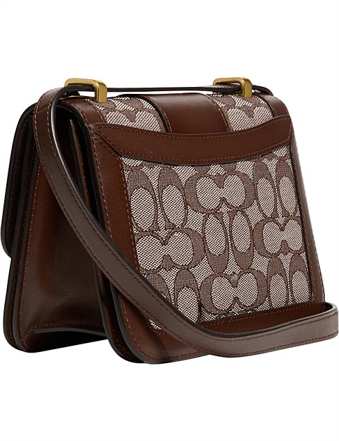 alie shoulder bag 18 in signature jacquard with snakeskin detail