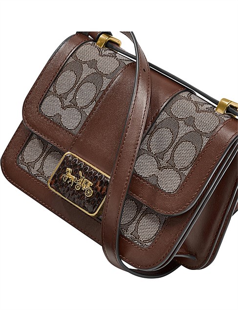 alie shoulder bag 18 in signature jacquard with snakeskin detail