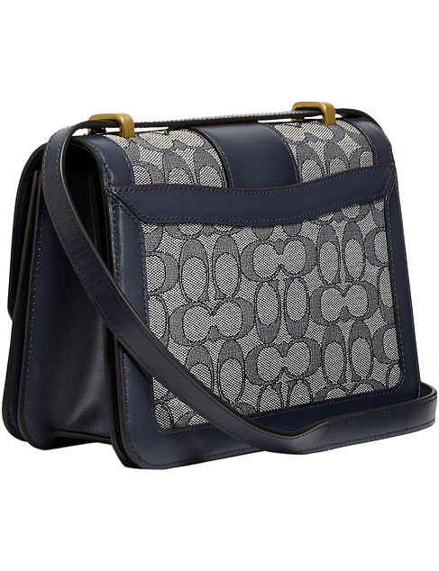 alie shoulder bag in signature jacquard with snakeskin detail