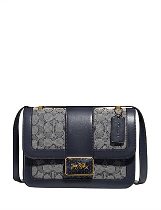 alie shoulder bag 18 in signature jacquard with snakeskin detail