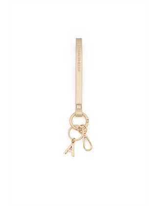 PALE GOLD WRIST LETTER STRAP